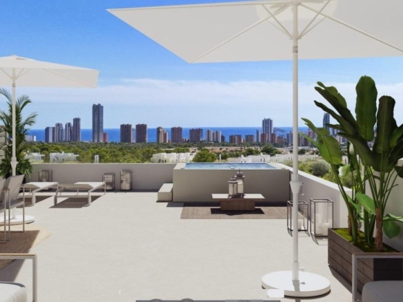 Spacious sun-drenched terrace with panoramic sea and mountain views in exclusive 3-bedroom penthouse, Sierra Cortina, Finestrat.