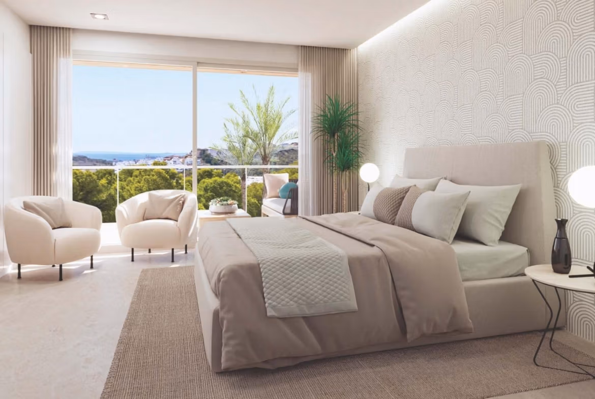 Bright, elegant bedroom with plush seating, textured wall, and balcony overlooking lush greenery in spacious Sierra Cortina apartment.