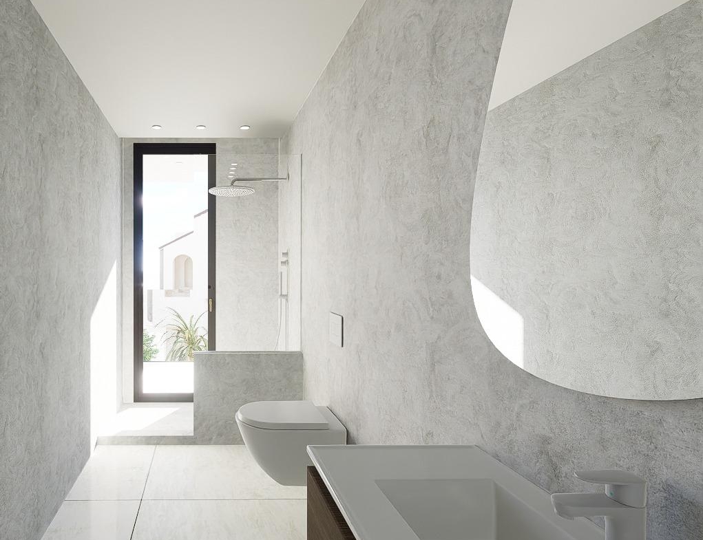 Bright, modern bathroom with sleek fixtures and walk-in shower in luxury 4-bedroom villa in La Zenia, Orihuela Costa.
