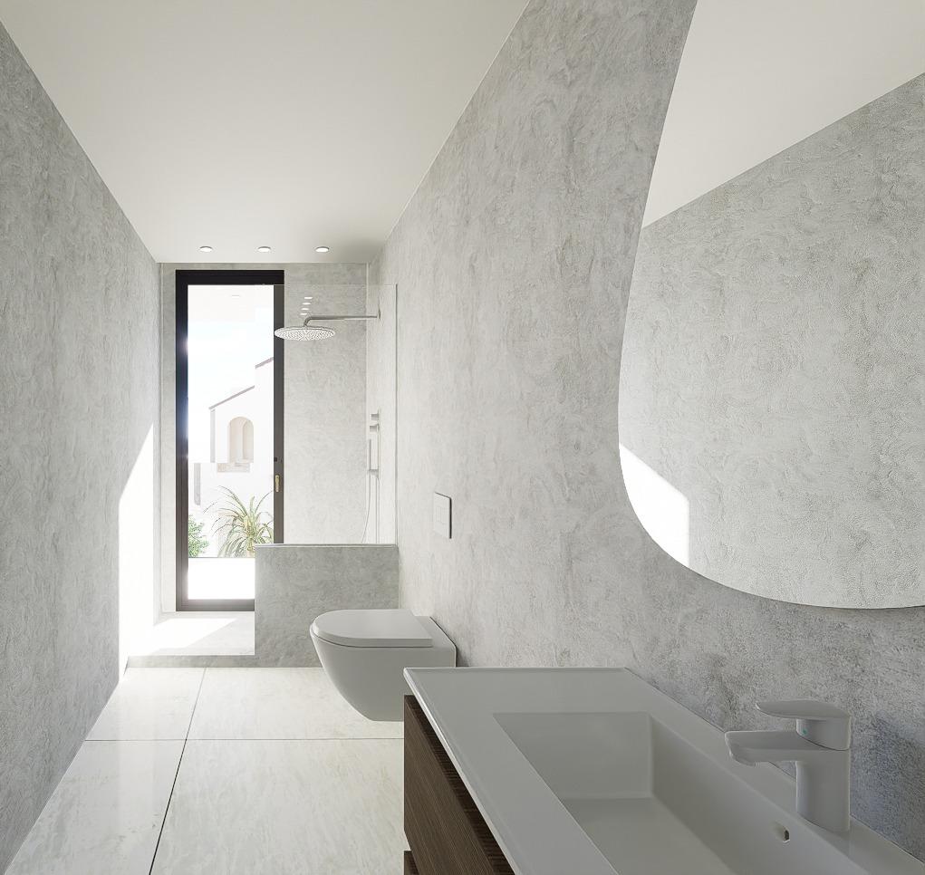Bright, modern bathroom with sleek fixtures and walk-in shower in luxury 4-bedroom villa in La Zenia, Orihuela Costa.