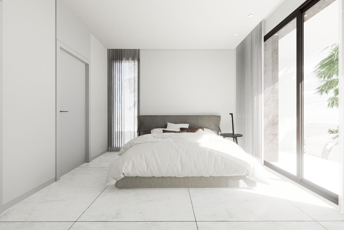 Bright, minimalist bedroom with floor-to-ceiling windows in luxury 4-bedroom villa in La Zenia, Orihuela Costa.