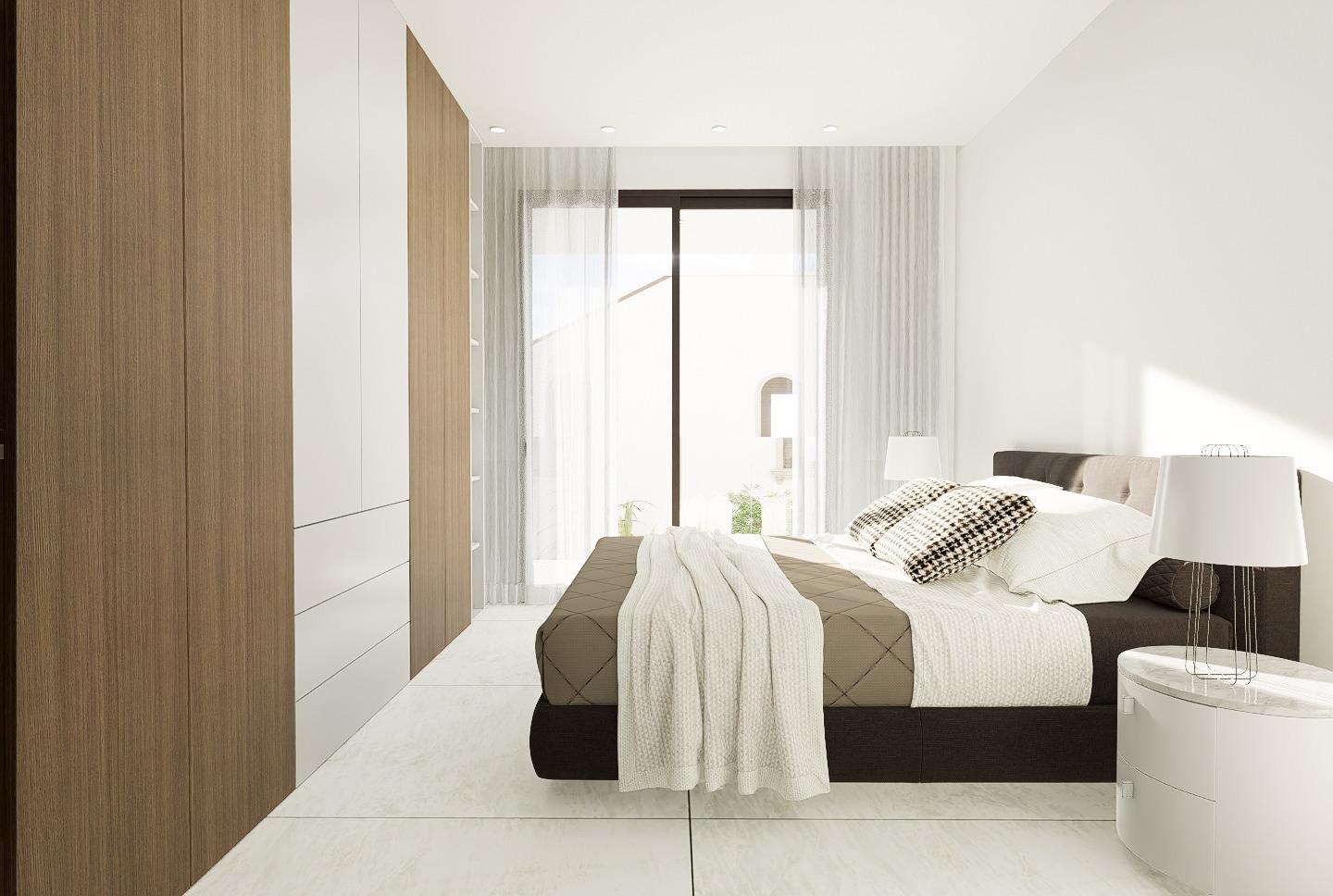Bright and modern master bedroom with floor-to-ceiling windows in luxury 4-bedroom villa, La Zenia, Orihuela Costa.