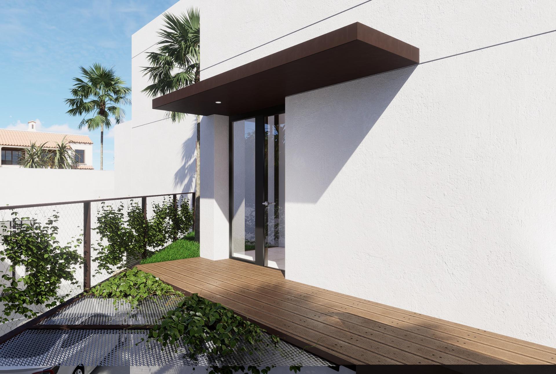 Modern entrance with sleek wood decking and lush greenery at luxury 4-bedroom villa in La Zenia, Orihuela Costa