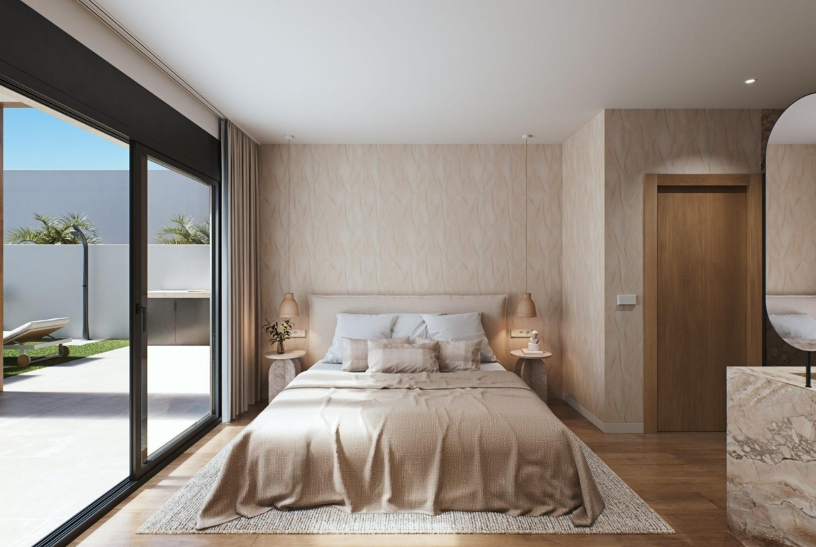 Luxury-New-Build-Villas-in-Sucina-with-Private-Pool-and-Large-Plots-10 Bright and elegant bedroom with floor-to-ceiling glass doors opening to a sunlit terrace in luxury single-storey villa in Sucina, Murcia