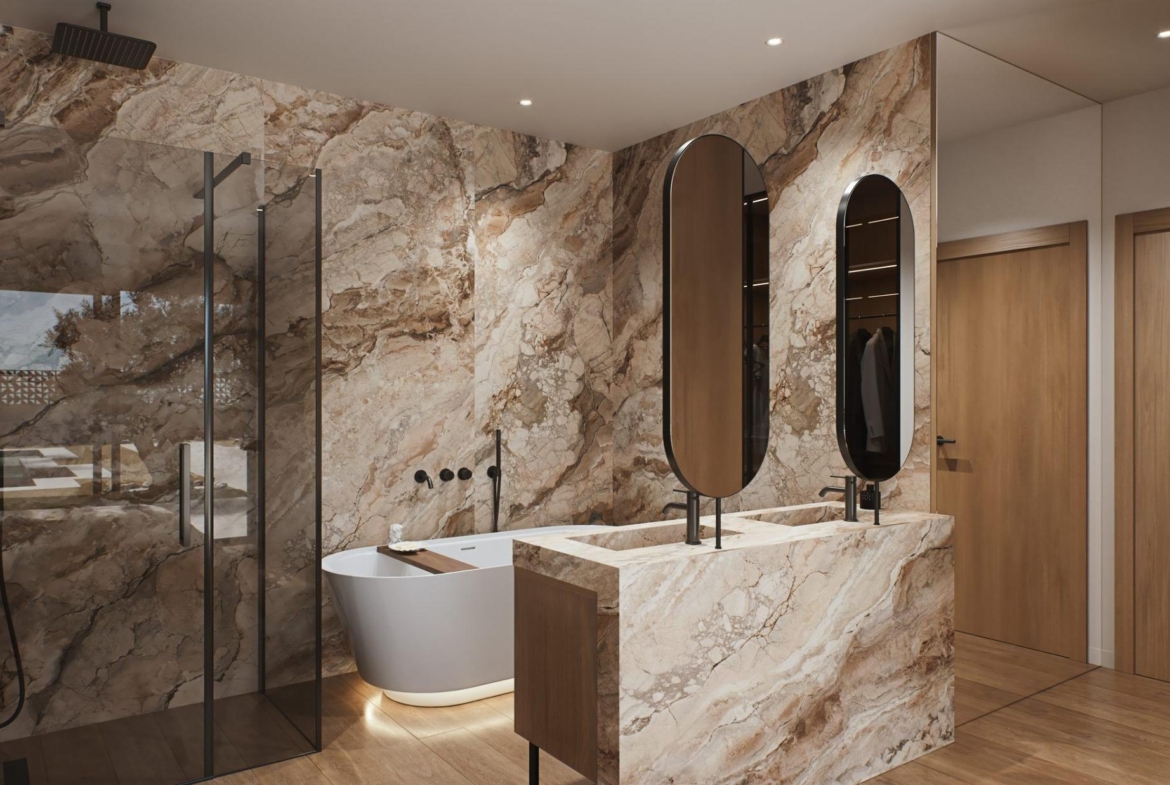 Luxury-New-Build-Villas-in-Sucina-with-Private-Pool-and-Large-Plots-12 Elegant marble-clad bathroom with freestanding tub and double oval mirrors in luxury new build villa in Sucina, Murcia