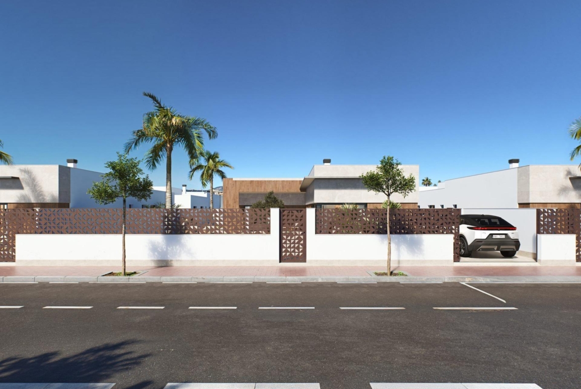 Luxury-New-Build-Villas-in-Sucina-with-Private-Pool-and-Large-Plots-14 Modern luxury single-storey villa with sleek white facade, private gated entrance, and palm trees in sunny Sucina, Murcia