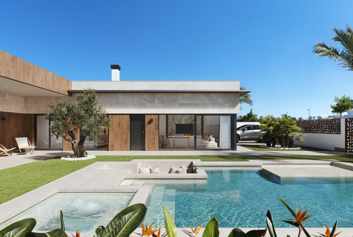 Luxury-New-Build-Villas-in-Sucina-with-Private-Pool-and-Large-Plots-4 Elegant single-storey villa in Sucina, Murcia, featuring a modern private pool, sunken lounge, and lush landscaped garden.