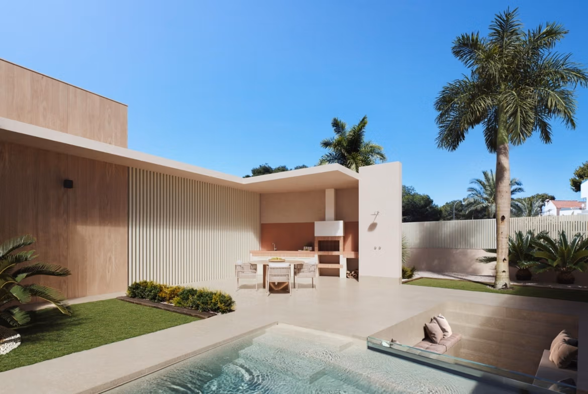 Luxury-New-Build-Villas-with-Sea-Views-in-Dehesa-de-Campoamor-Costa-Blanca-South-3 Modern spacious 4-bedroom villa in Dehesa de Campoamor with sleek pool, outdoor dining, and lush palm-fringed landscaping.