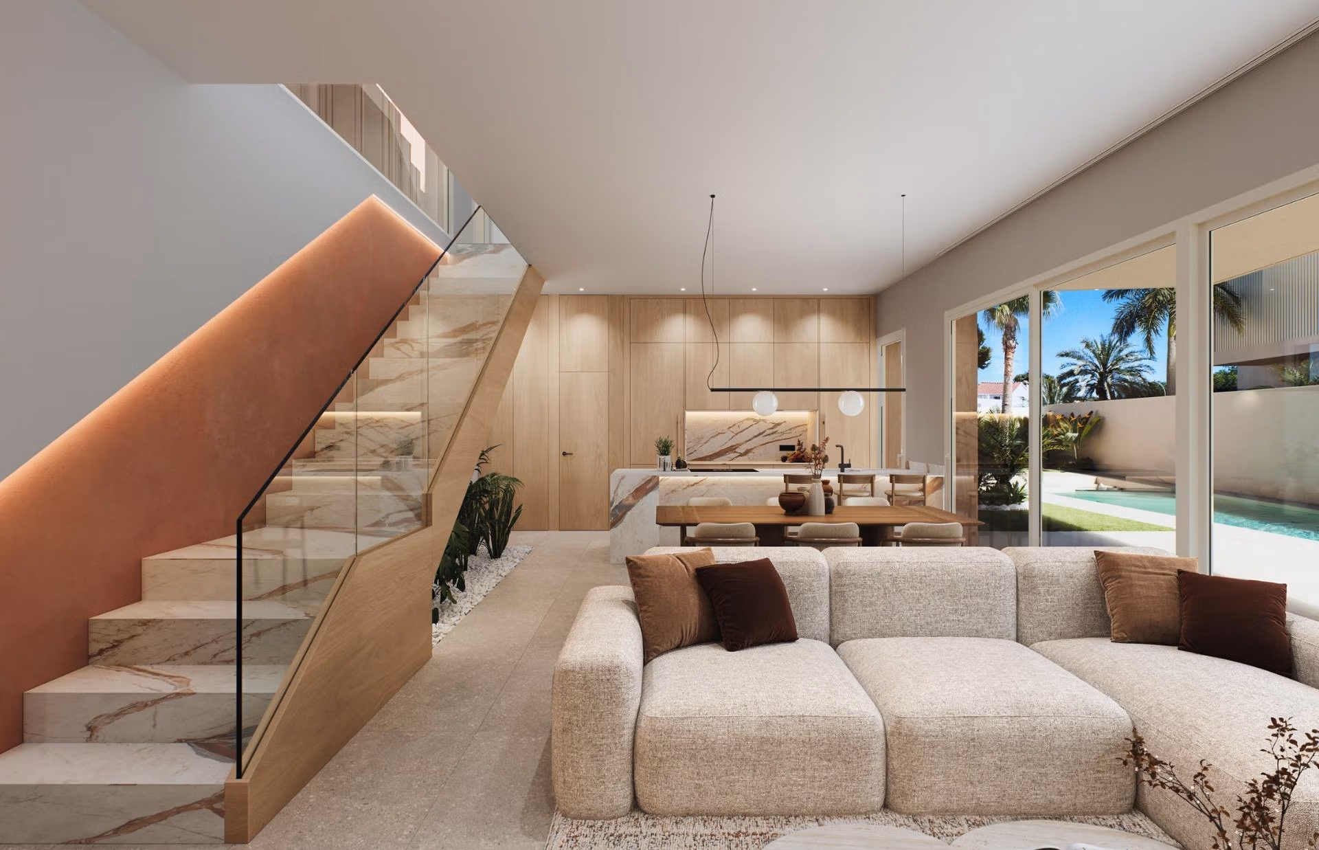 Luxury-New-Build-Villas-with-Sea-Views-in-Dehesa-de-Campoamor-Costa-Blanca-South-5 Bright, modern living room with plush sofa, open-plan kitchen, marble staircase, and garden views in Dehesa de Campoamor villa.