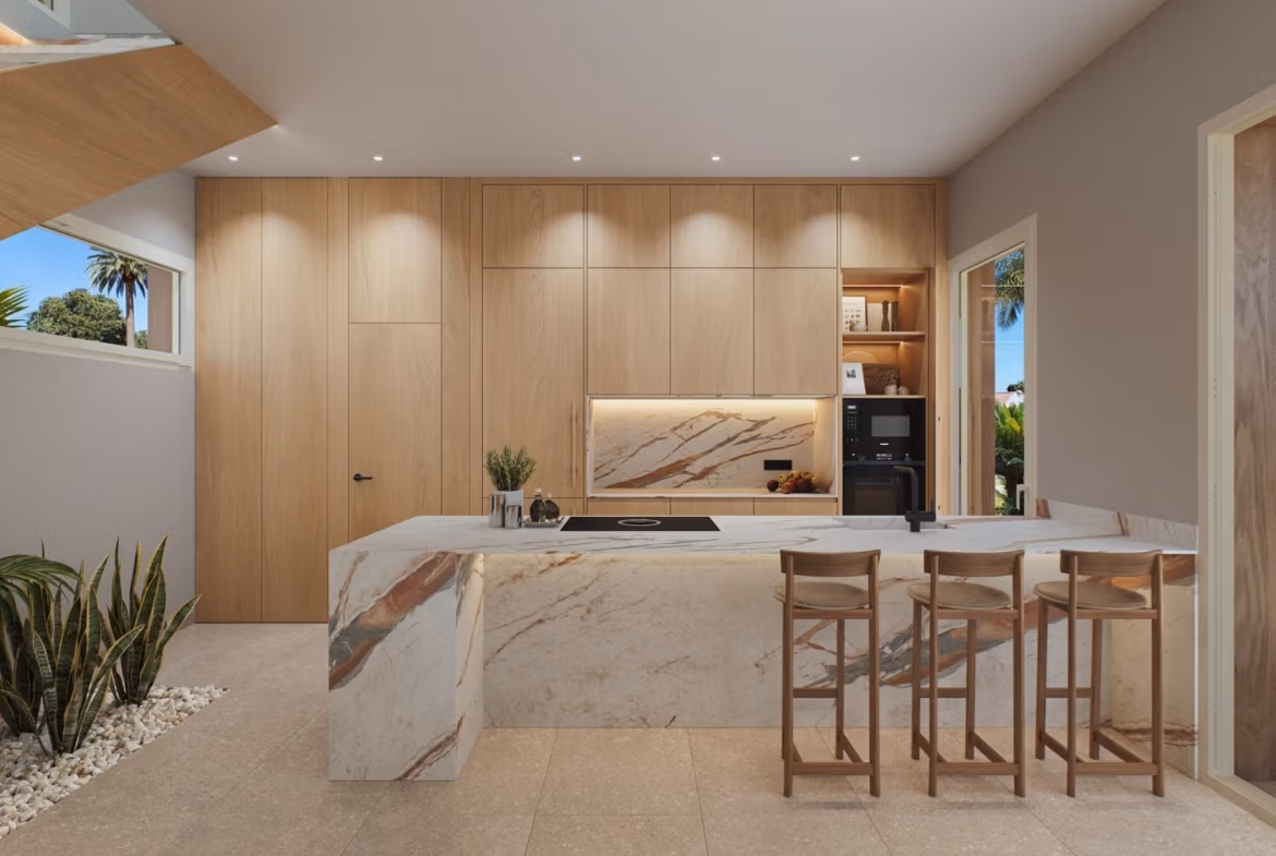 Luxury-New-Build-Villas-with-Sea-Views-in-Dehesa-de-Campoamor-Costa-Blanca-South-6 Modern open-plan kitchen with sleek marble island and natural wood cabinetry in spacious 4-bedroom villa, Dehesa de Campoamor.