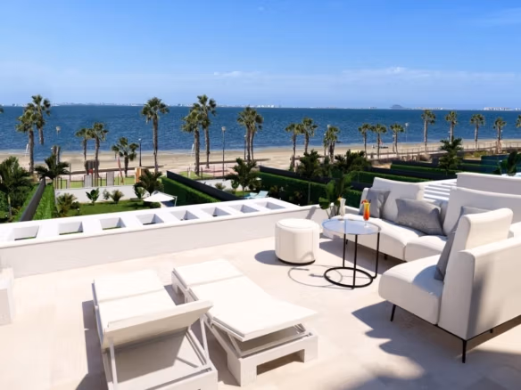 Sun-drenched terrace with elegant lounge seating and panoramic sea views at luxury 3-bedroom waterfront villa, Los Alcázares.