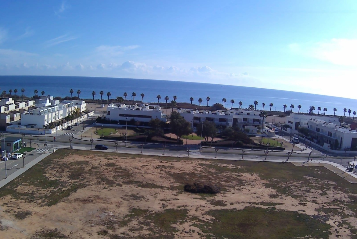 Panoramic sea view from a stylish new build 3-bedroom apartment terrace in Torre de la Horadada, steps from the beach.