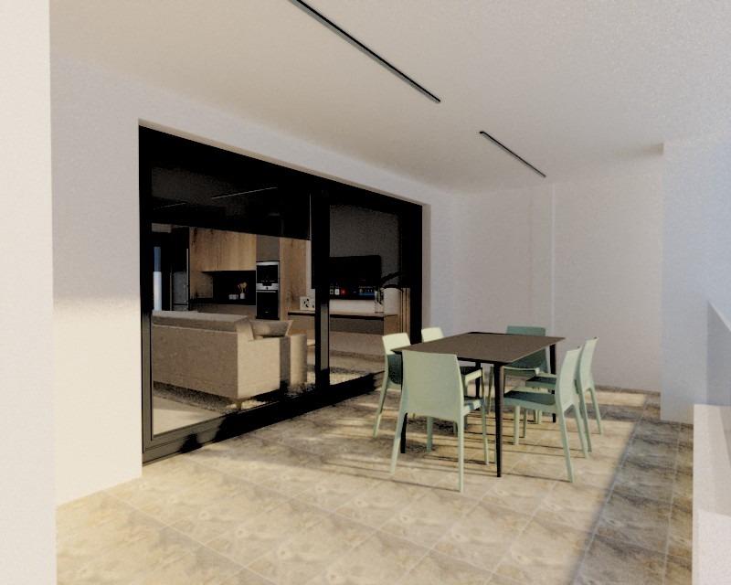 Spacious sun-drenched terrace with modern dining set in a 3-bedroom ground floor apartment in Torre de la Horadada.