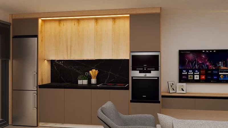 Modern open-plan kitchen with sleek cabinetry and built-in appliances in exclusive Torre de la Horadada 3-bedroom penthouse.