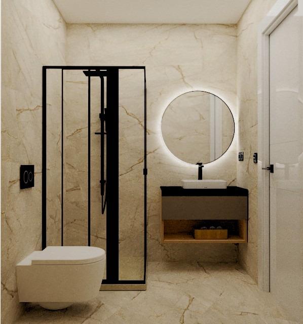 Modern spa-inspired bathroom with sleek black fixtures and elegant marble walls in luxury Torre de la Horadada penthouse.