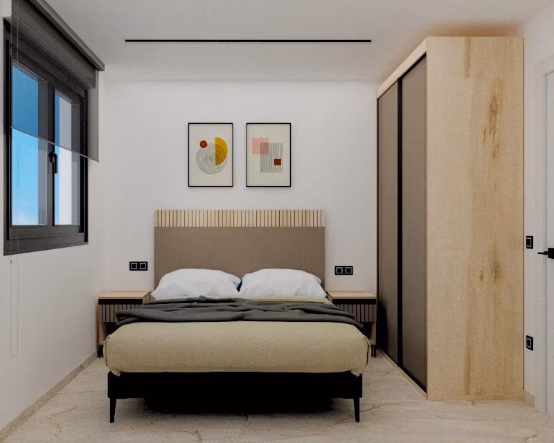 Bright, modern bedroom with elegant décor in exclusive 3-bedroom penthouse in Torre de la Horadada Phase 2 near sea views