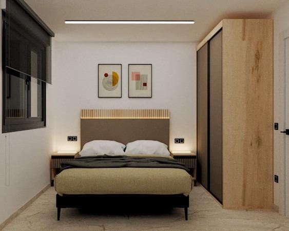 Bright modern bedroom with elegant wood wardrobe in a luxury 3-bedroom ground floor apartment in Torre de la Horadada.