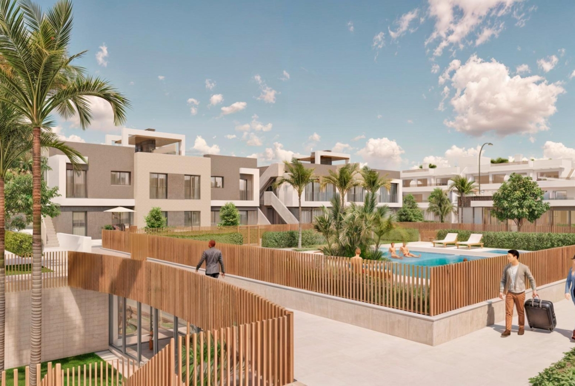 Modern luxury penthouse complex in Torre de la Horadada featuring a landscaped pool area and bright open communal spaces.