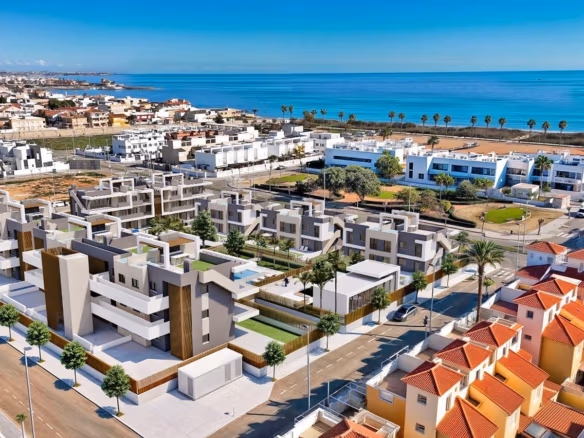 Modern luxury apartment complex with spacious terraces and private gardens near the beach in Torre de la Horadada.