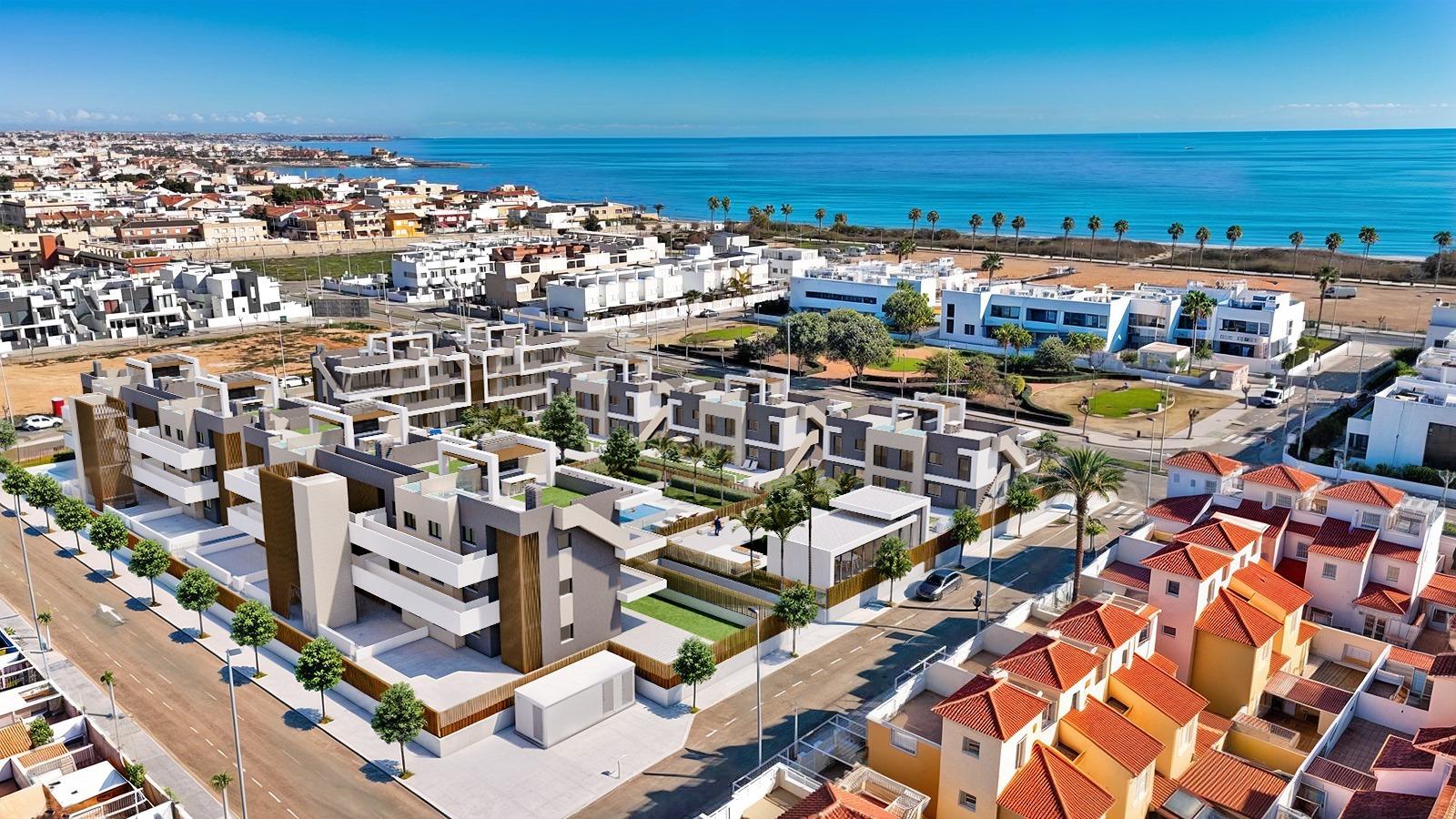 Modern luxury apartment complex with spacious terraces and private gardens near the beach in Torre de la Horadada.