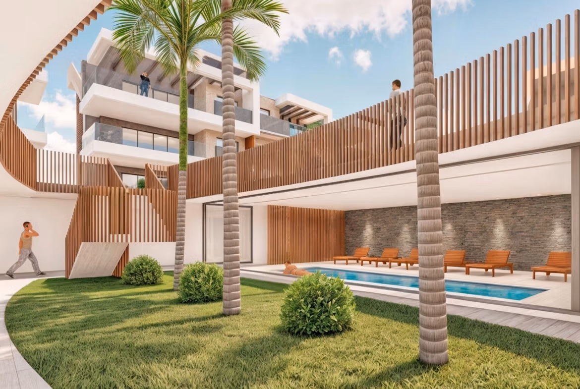 Modern sun-drenched pool terrace with lush landscaping at exclusive 3-bedroom penthouse, Torre de la Horadada Phase 2.
