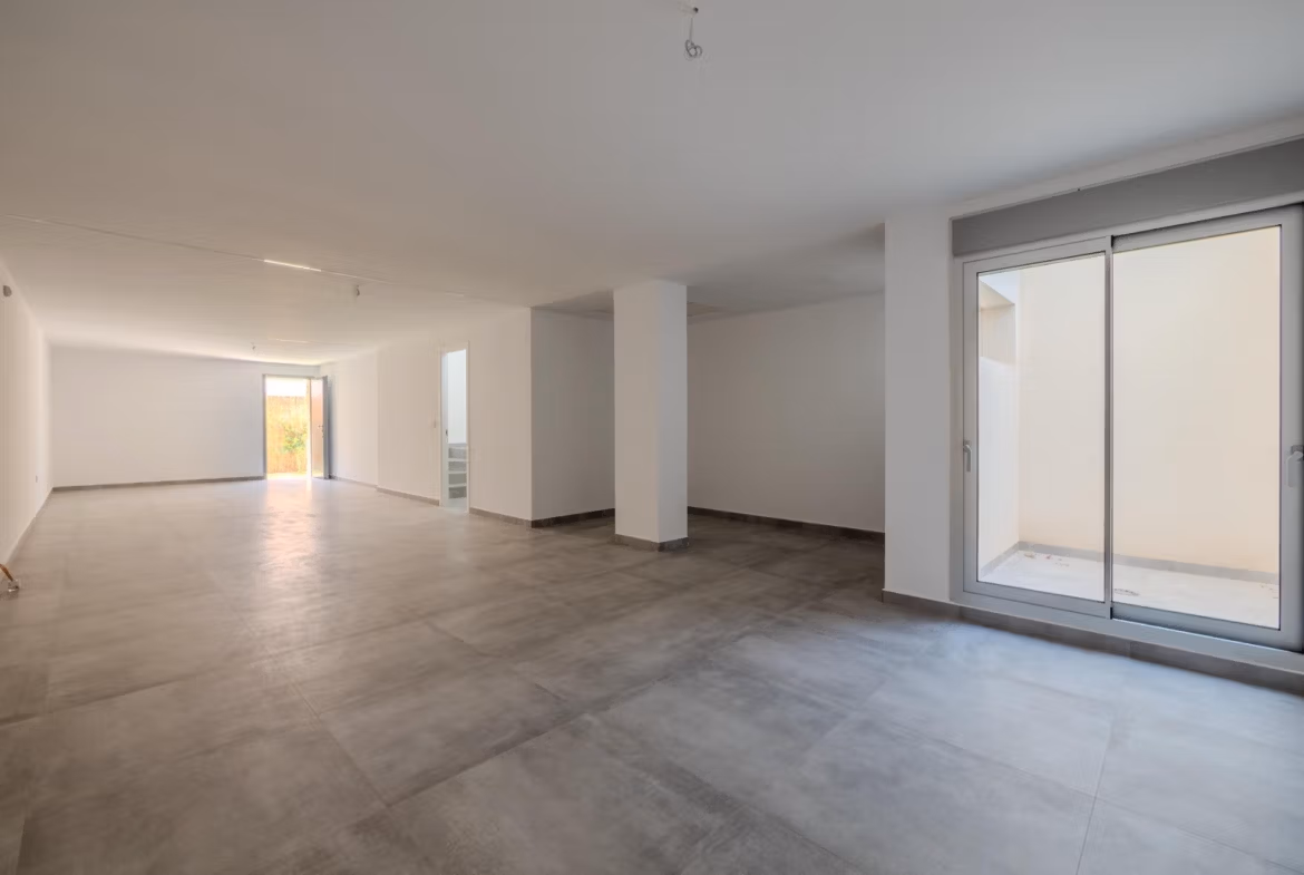 Spacious bright basement with large windows and modern flooring in a luxury 4-bedroom villa in Algorfa, La Finca.