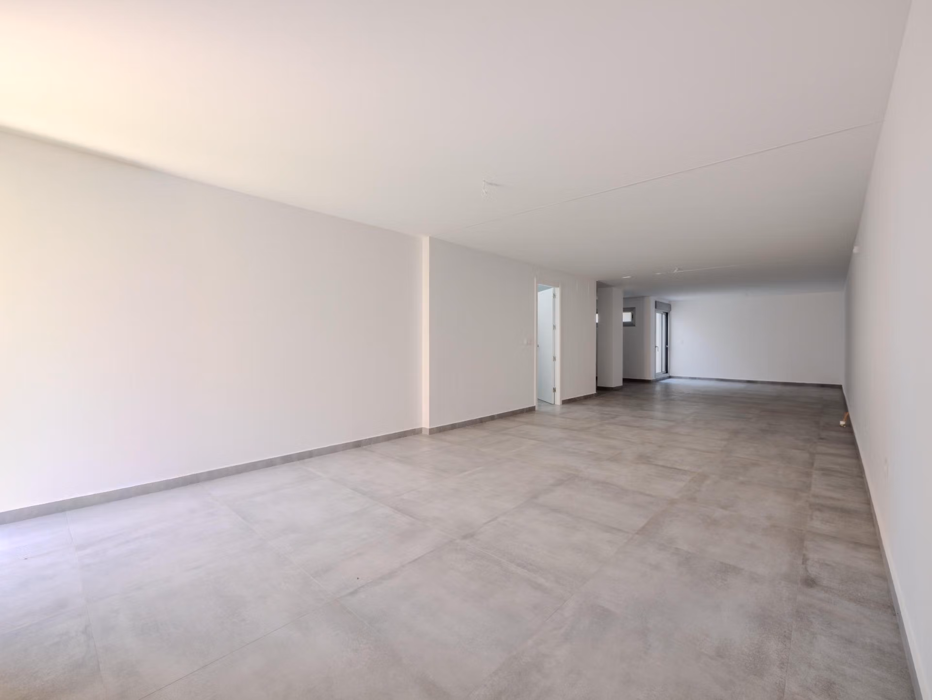 Spacious modern basement with sleek tiled floors in an impressive 4-bedroom villa for sale in Algorfa, La Finca