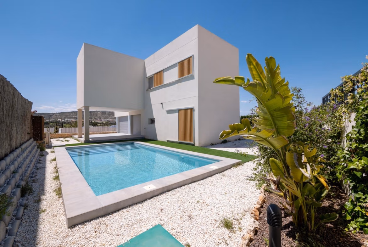 Modern sun-drenched 4-bedroom villa in Algorfa with pristine private pool and minimalist landscaped garden with golf views