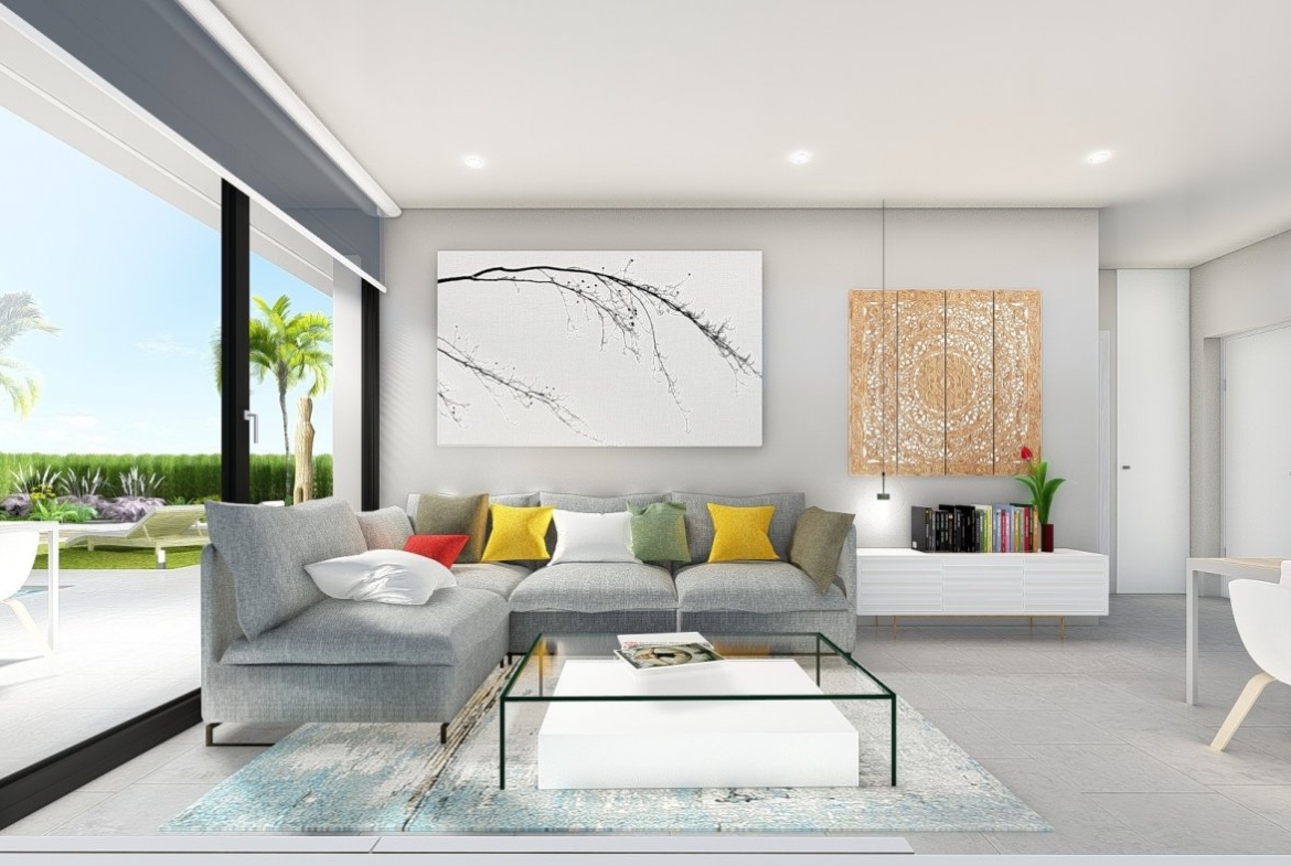 Bright, modern living room with sleek furniture and views of lush garden terrace in a charming 2-bedroom villa in Calasparra, Murcia.