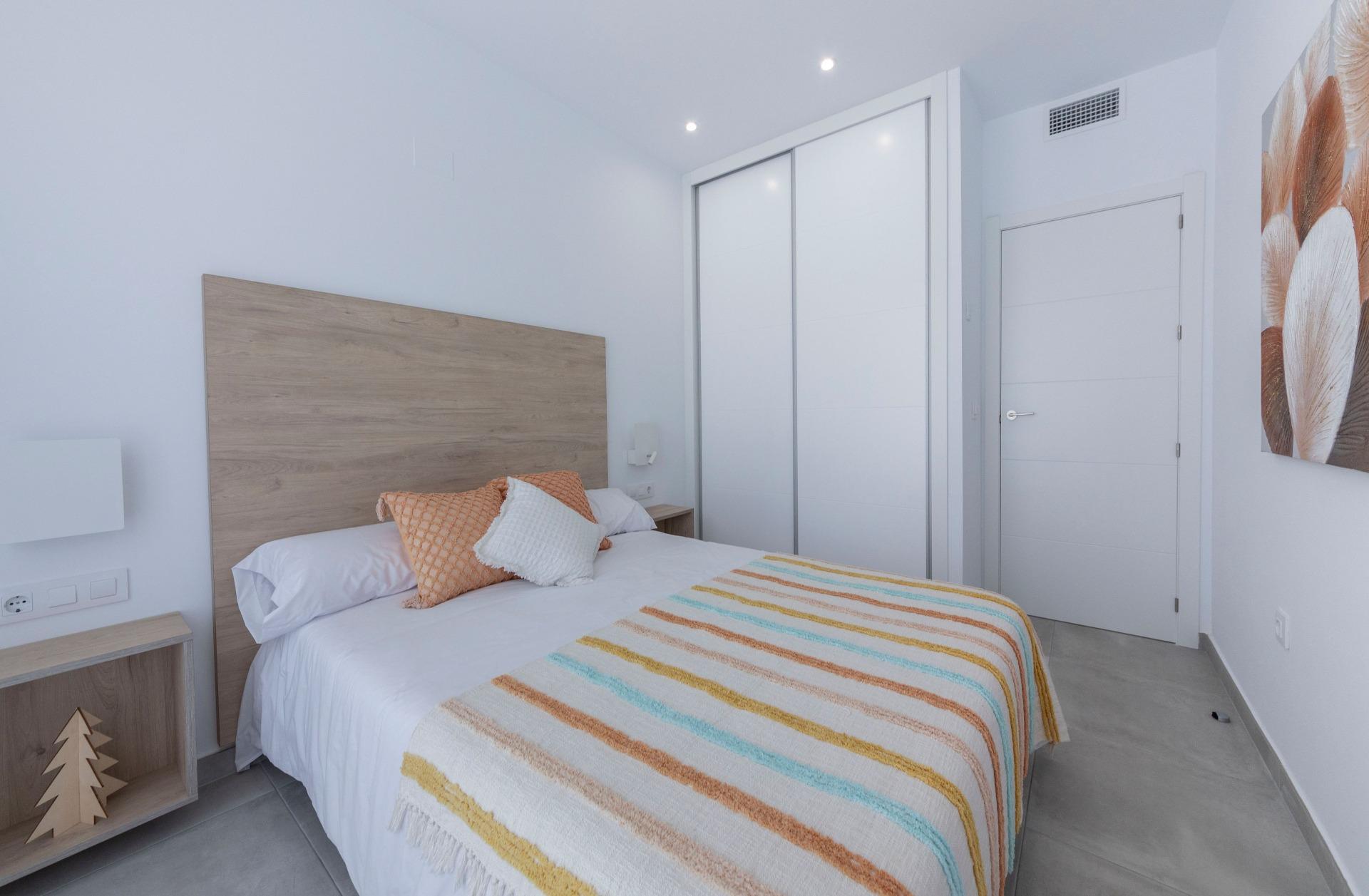 Bright, modern bedroom with minimalist decor in a stylish 3-bedroom villa in Calasparra, Murcia.