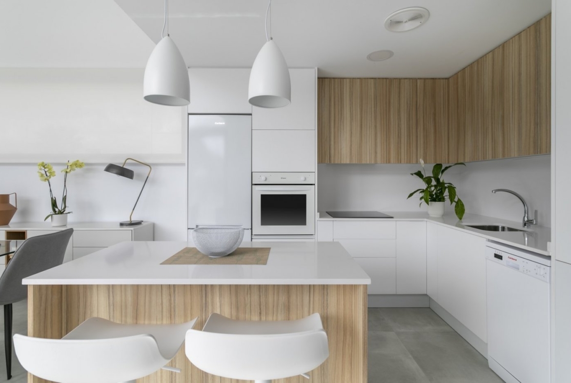 Modern, bright kitchen with sleek wood accents in a spacious 3-bedroom villa in Calasparra, Murcia.