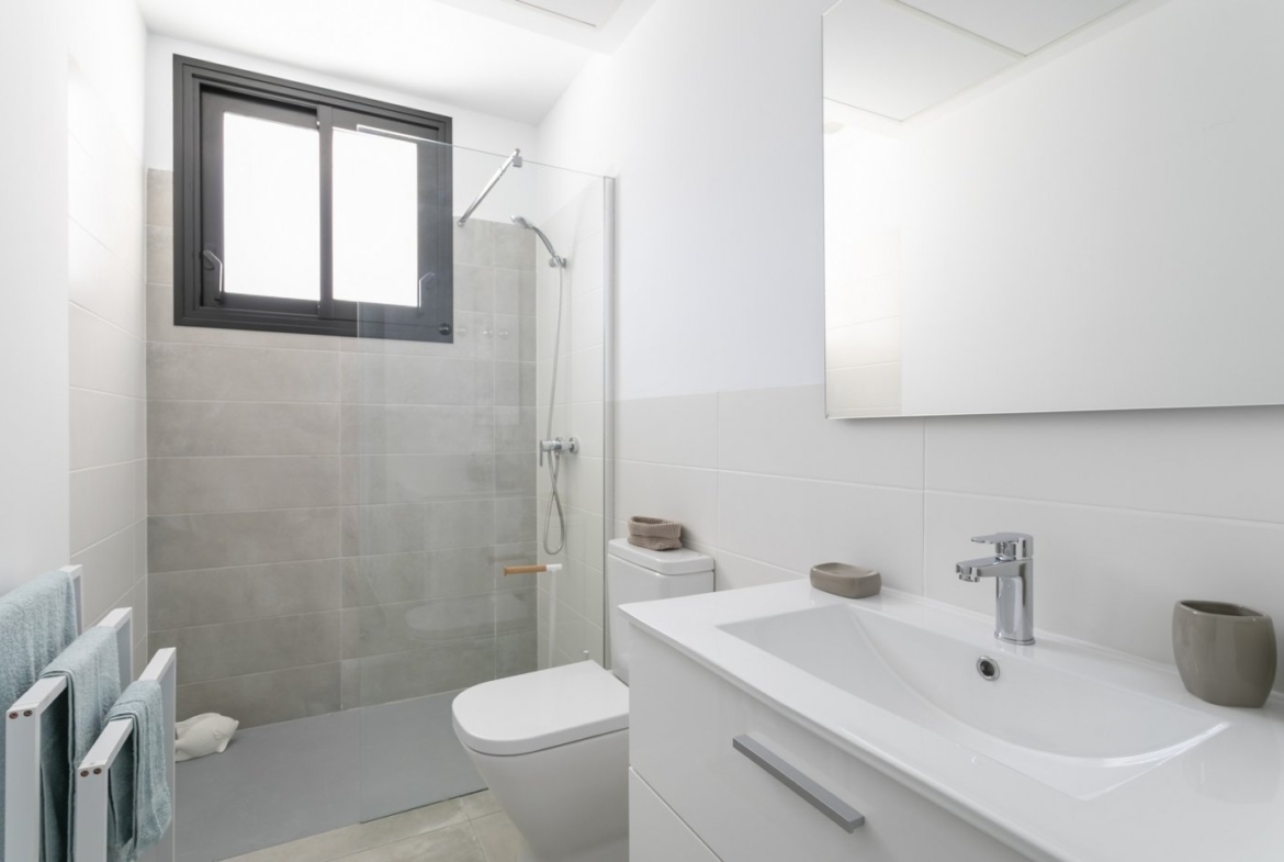 Bright modern bathroom with sleek fixtures in a spacious new build 3-bedroom villa in Calasparra, Murcia