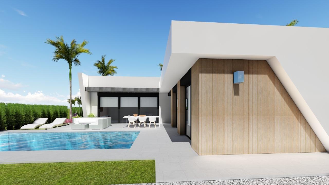 Sleek modern 3-bedroom villa in Calasparra with private pool, spacious terrace, and sunlit outdoor relaxing area on large plot.