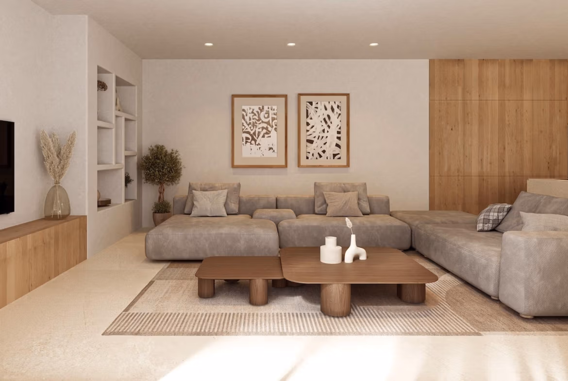 Bright, elegant living room with plush sofas and wooden accents in a single-storey Ibizan-style villa in La Fustera, Benissa.