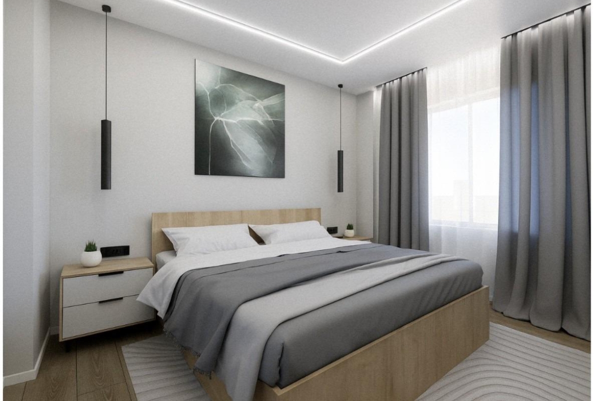 Bright and modern bedroom in a new 2-bedroom apartment near Playa El Acequión, Torrevieja, with sleek design and soft natural light.