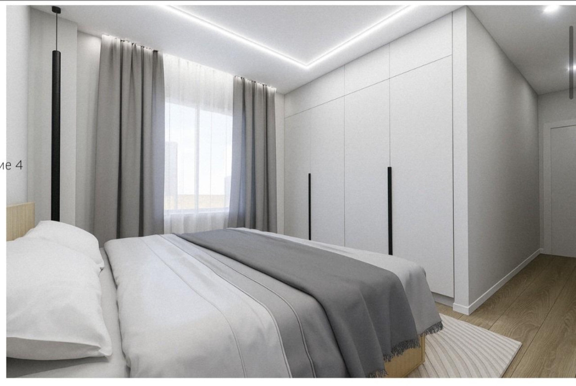 Bright, modern bedroom with sleek built-in wardrobes in a 2-bedroom penthouse near Playa El Acequión, Torrevieja.