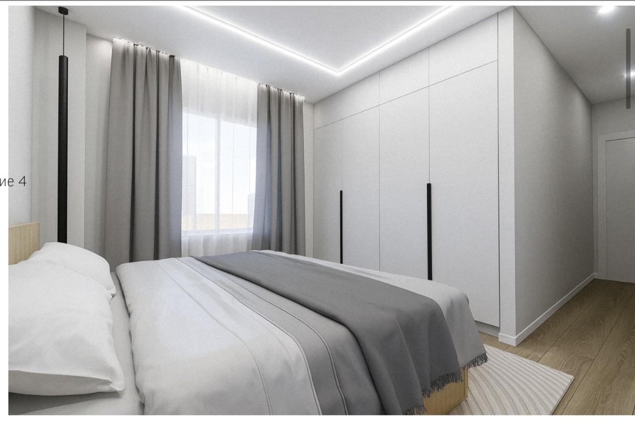 Bright, modern bedroom with sleek built-in wardrobes in a 2-bedroom penthouse near Playa El Acequión, Torrevieja.