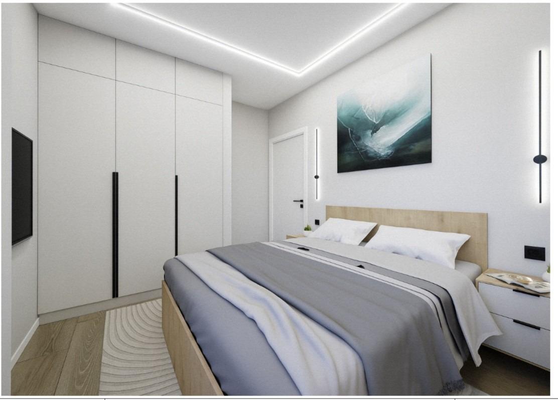 Bright modern bedroom with sleek storage and stylish decor in elevated 2-bedroom penthouse near Playa El Acequión, Torrevieja