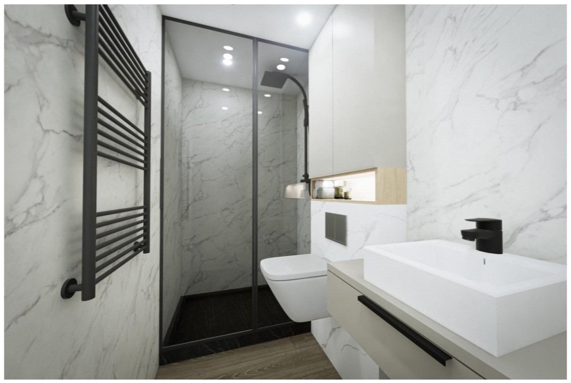 Modern sleek bathroom with black fixtures and marble walls in a 2-bedroom penthouse near Playa El Acequión, Torrevieja.