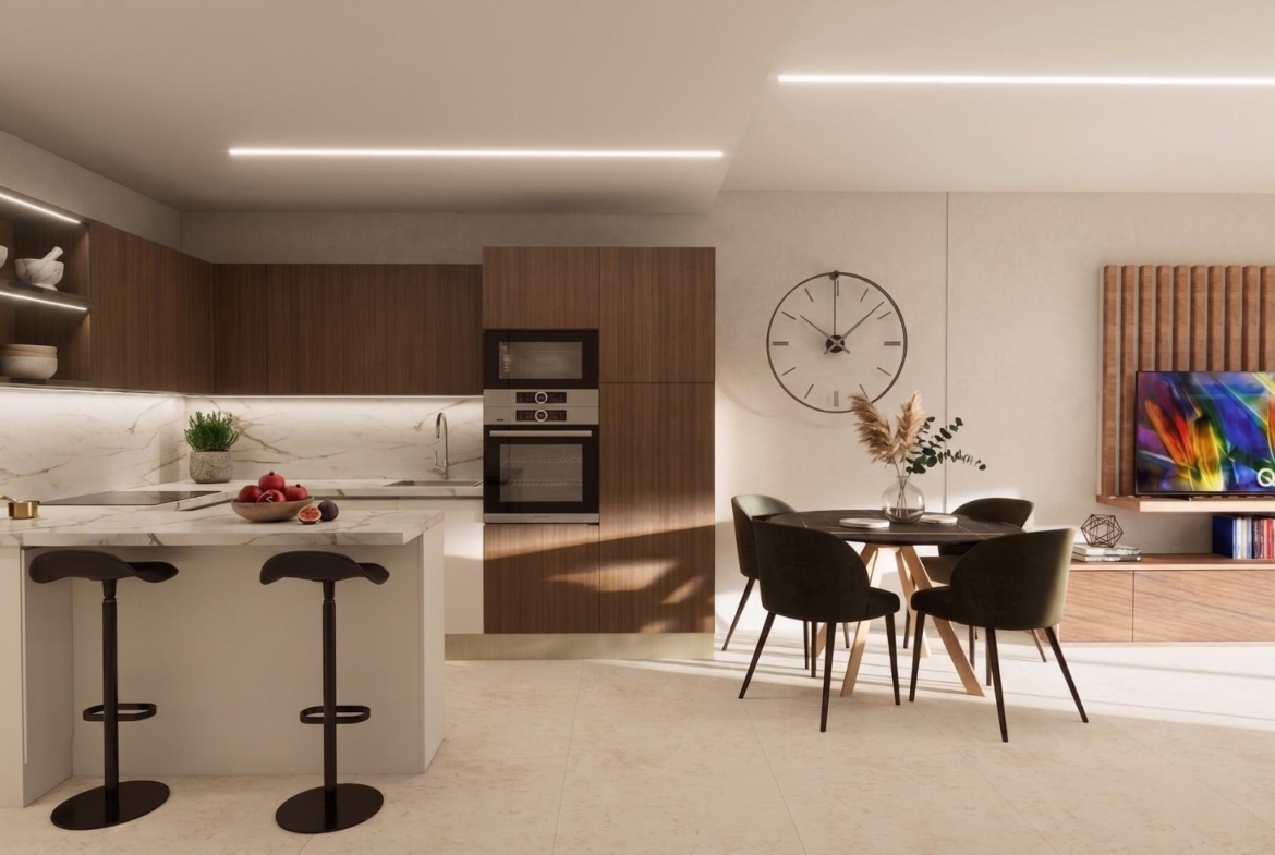 Bright modern open-plan kitchen and dining area in luxury 2-bedroom apartment with terrace in El Raso, Guardamar del Segura.