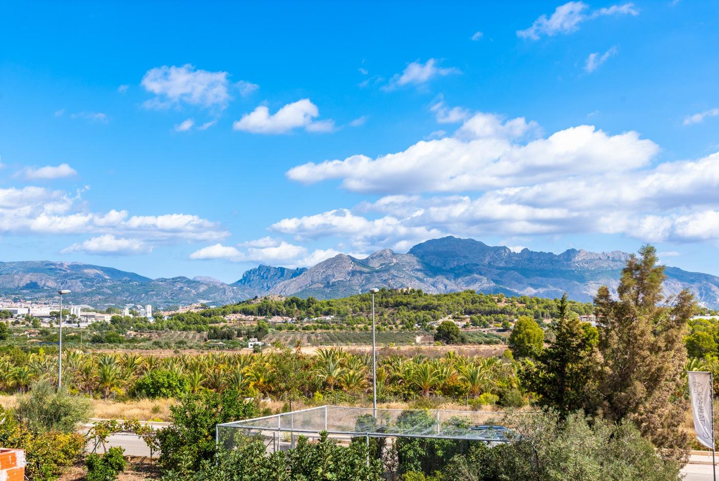 Panoramic mountain and lush greenery views from the spacious luxury 5-bedroom villa in Polop de la Marina