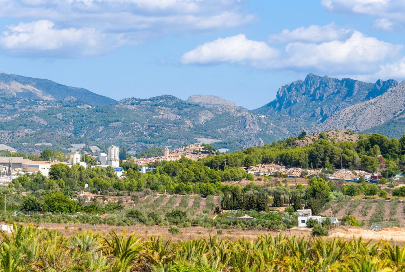 Panoramic mountain and sea views from the grounds of a spacious luxury 5-bedroom villa in Polop de la Marina.