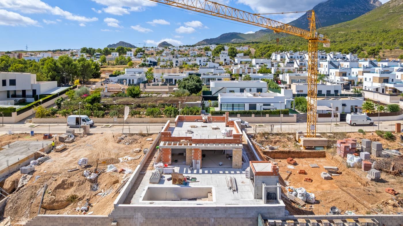 Under-construction spacious luxury 5 bedroom villa with stunning sea and mountain views in Polop de la Marina.