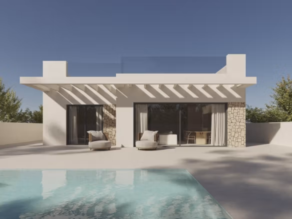 Modern luxury villa exterior in Polop de la Marina with sleek pool, sunlit terrace, and elegant stone accents.