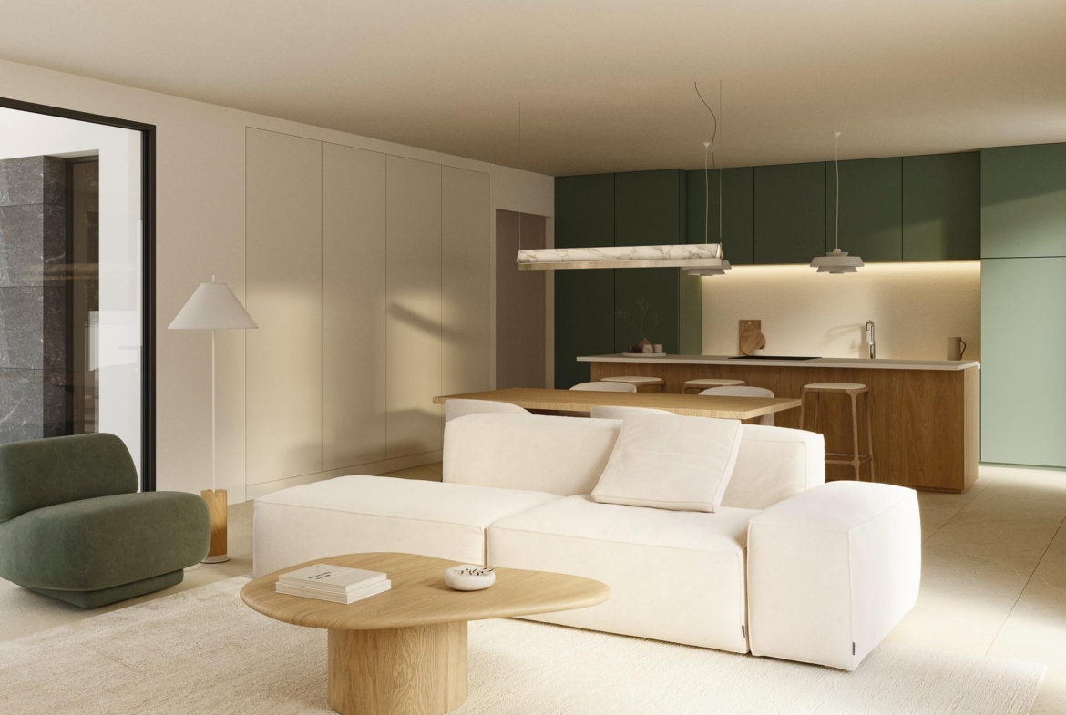Bright, modern open-plan living area with elegant kitchen and cozy seating in luxury 5-bedroom villa in Polop de la Marina.