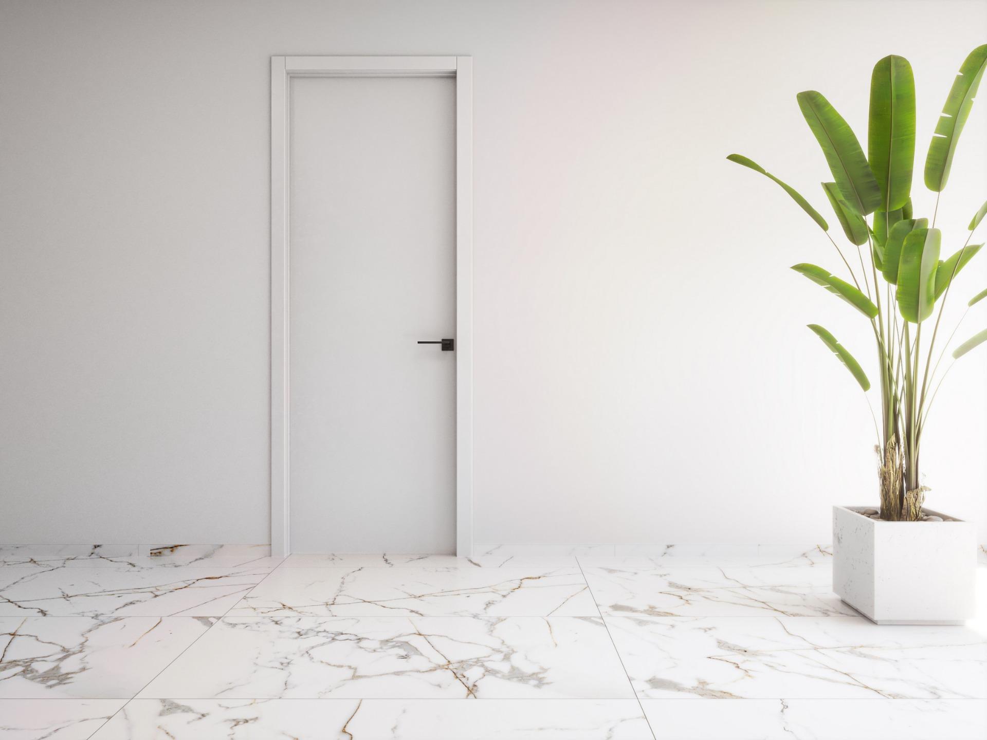Minimalist bright interior with elegant marble flooring and modern door in exclusive 2 bedroom penthouse, Torrevieja.