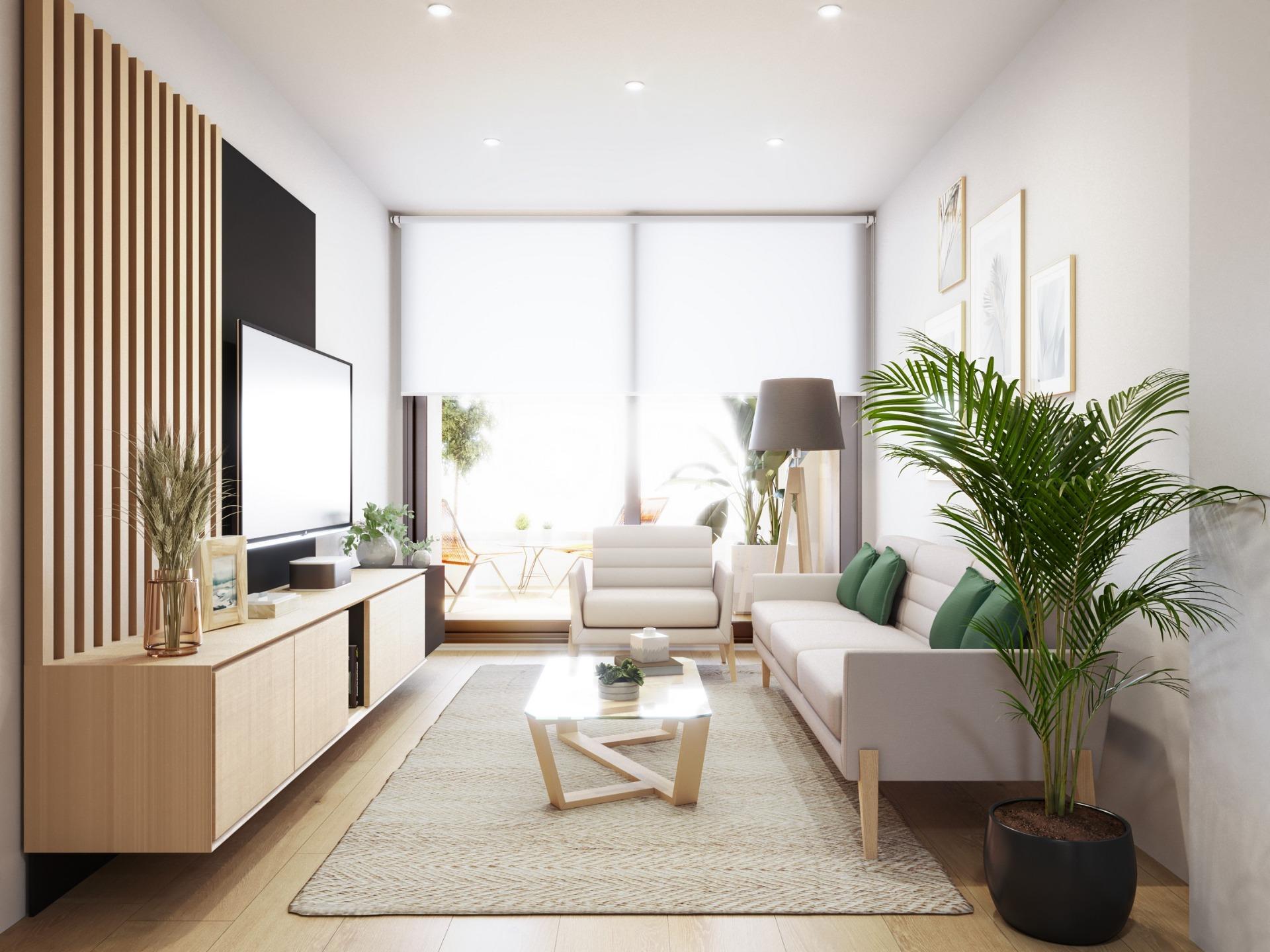 Bright, modern living room with sleek wooden accents and terrace access in a 2-bedroom ground floor apartment in Torrevieja.