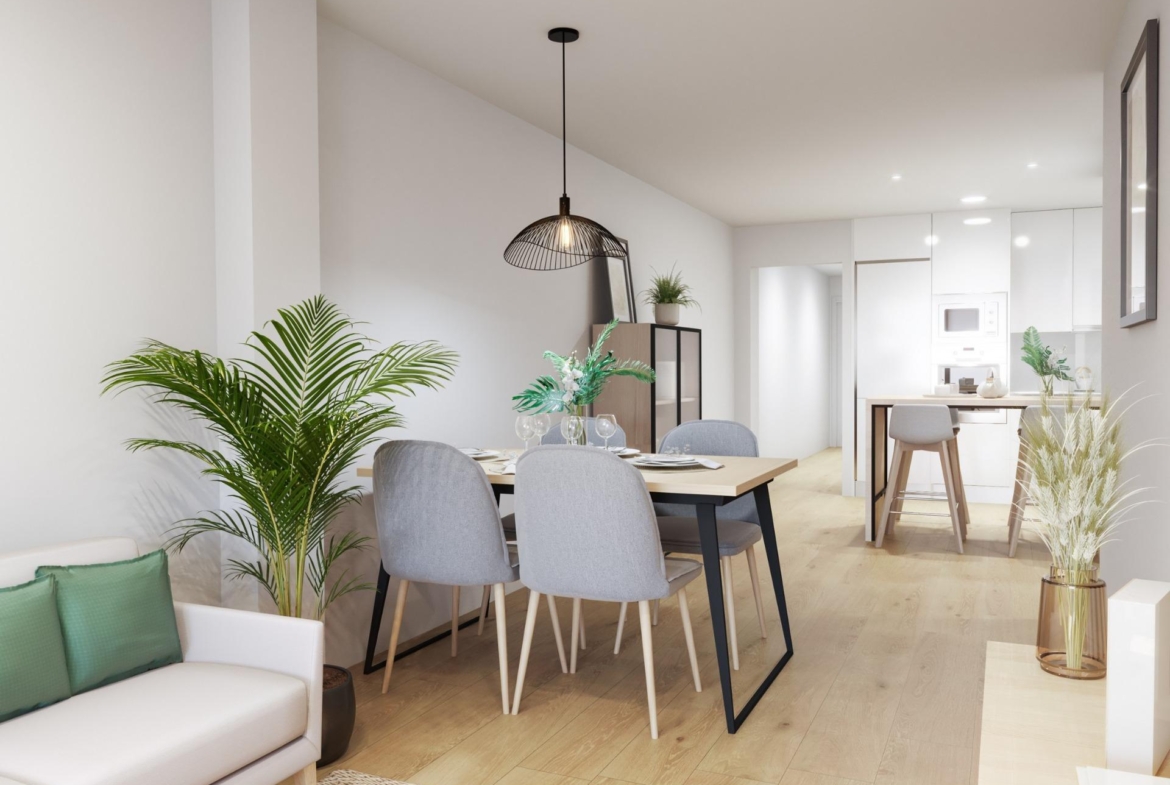 Bright modern open-plan dining and kitchen area in stylish 2-bedroom ground floor apartment near Playa del Cura, Torrevieja.