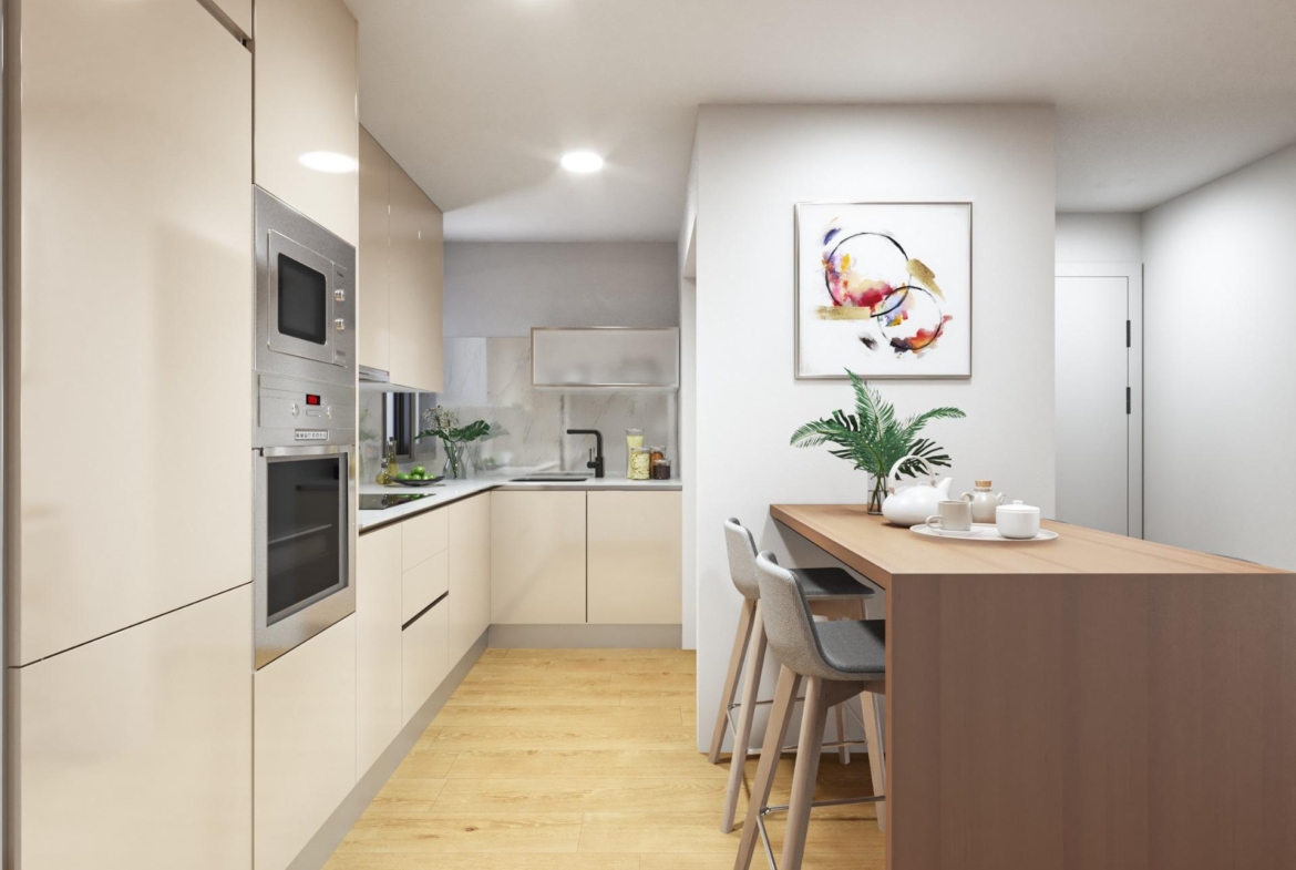 Modern, sleek kitchen with elegant cabinetry and breakfast bar in a 2-bedroom penthouse near Playa del Cura, Torrevieja