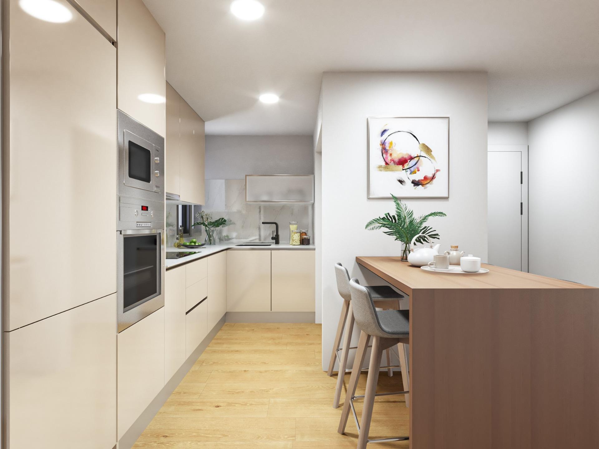 Modern, sleek kitchen with elegant cabinetry and breakfast bar in a 2-bedroom penthouse near Playa del Cura, Torrevieja